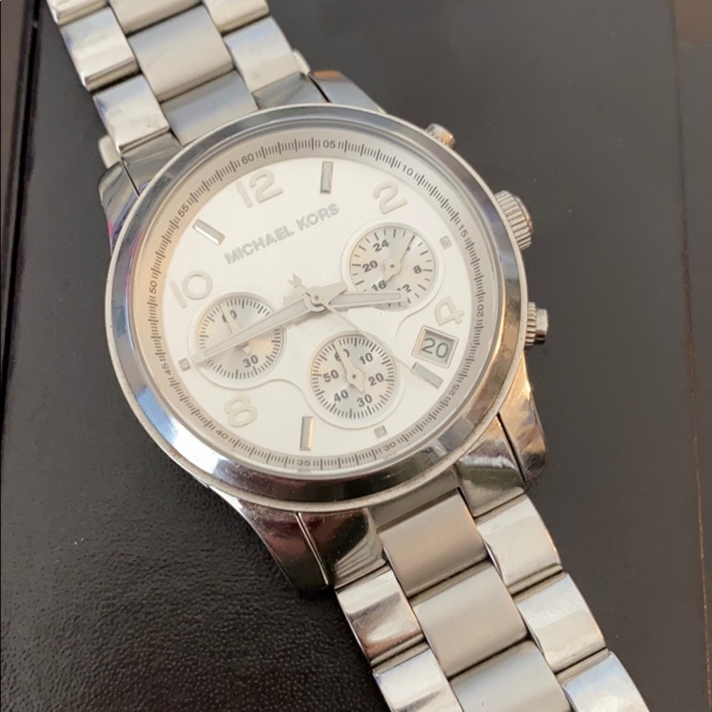 Micheal Kors watch . Stainless steel